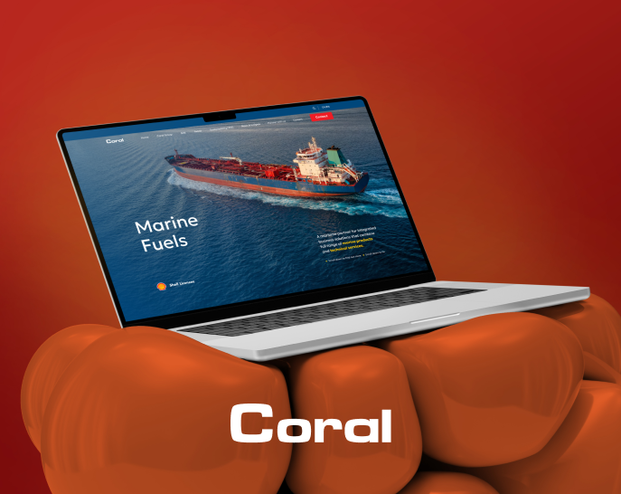 Laptop on orange background showcasing Coral Website